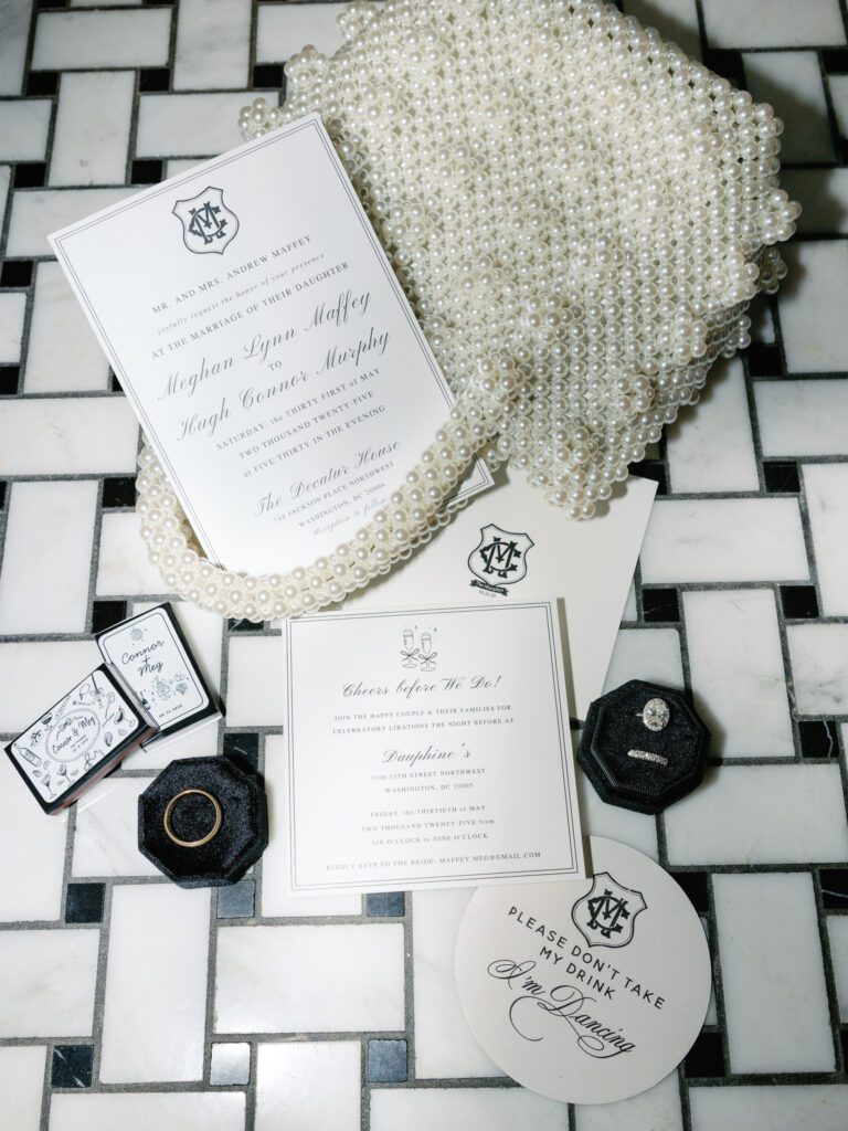 Black and white invitation flatlay